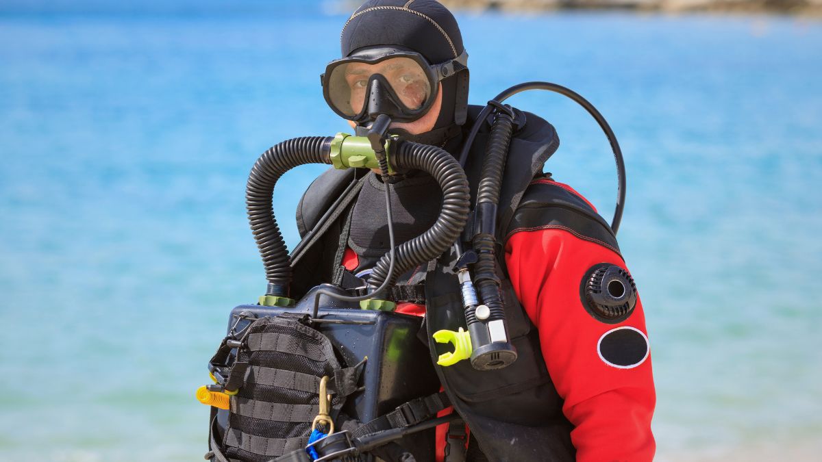 Complete technical diving gear setup with rebreather