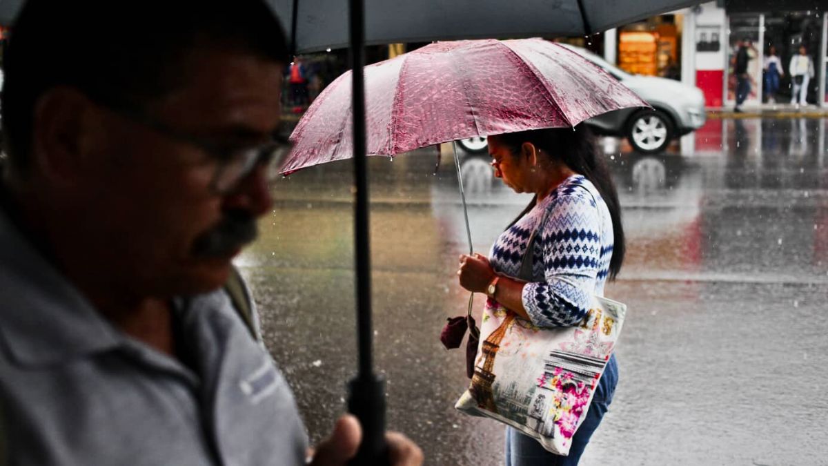 Tropical rain shower and rainbow in Costa Rica’s green season